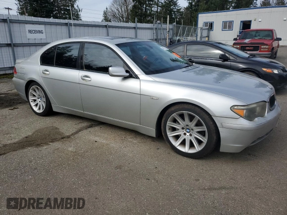 2004 BMW 7 Series 745i with VIN WBAGL63484DP69753, listed as a Copart auction lot 49211195 with 203,767 mi miles and Clean Title. Bid and sale history available at DreamBid. Image 4.