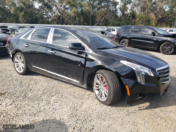 2018 Cadillac XTS Luxury with VIN 2G61M5S36J9117797, listed as a Copart auction lot 88912045 with 77,702 mi miles and Salvage Title. Bid and sale history available at carsss.com. Image 4.