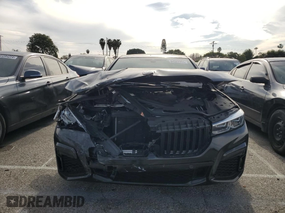 2021 BMW 7 Series 740i with VIN WBA7T2C01MCF51202, listed as a Copart auction lot 84522934 with Not provided miles and Salvage title. Bid and sale history available at DreamBid. Image 5.