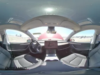 2024 Tesla Model Y Long Range with VIN 7SAYGDEE8RA233147, listed as a Copart auction lot 56695545 with 9,512 mi miles and Salvage title. Bid and sale history available at DreamBid. Image 14.