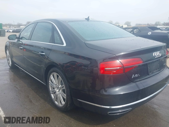 2015 Audi A8 3.0T with VIN WAU3GAFD7FN037726, listed as a IAAI auction lot 41793699 with 100,773 mi miles and . Bid and sale history available at DreamBid. Image 3.