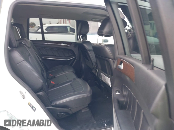 2014 Mercedes-Benz GL 450 z VIN 4JGDF7CE0EA424081, wystawiony jako IAAI lot #42359465 z przebiegiem 145 363 mil mil oraz . Historia ofert i sprzedaży dostępna na DreamBid. Obrazek 8.