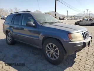2003 Jeep Grand Cherokee Laredo with VIN 1J4GX48S73C539185, listed as a Copart auction lot 46687915 with 265,008 mi miles and Salvage Title. Bid and sale history available at carsss.com. Image 4.