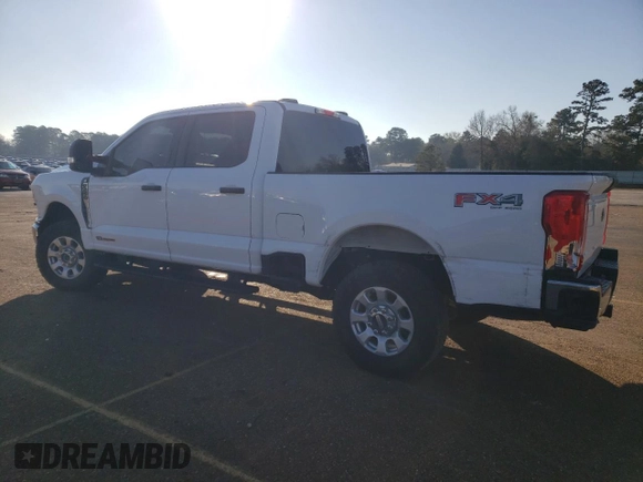 2023 Ford F-250 XL with VIN 1FT7W2BT3PEC29303, listed as a Copart auction lot 87230554 with 68,303 mi miles and Salvage Title. Bid and sale history available at DreamBid. Image 2.