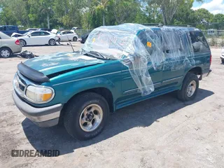 1998 Ford Explorer XLT z VIN 1FMZU32EXWUC84059, wystawiony jako IAAI lot #42260114 z przebiegiem 173 383 mil mil oraz . Historia ofert i sprzedaży dostępna na DreamBid. Obrazek 2.