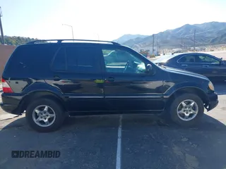 2001 Mercedes-Benz M-Class with VIN 4JGAB54E01A272539, listed as a IAAI auction lot 42124321 with 272,098 mi miles. Bid and sale history available at carsss.com. Image 13.