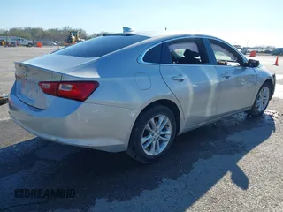 2018 Chevrolet Malibu LT z VIN 1G1ZD5ST1JF261841, wystawiony jako IAAI lot #41887177 z przebiegiem 128 213 mil mil oraz . Historia ofert i sprzedaży dostępna na DreamBid. Obrazek 4.