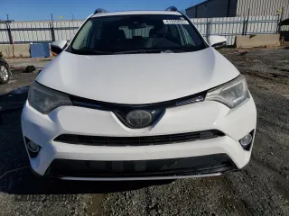 2018 Toyota RAV4 XLE with VIN 2T3WFREV2JW454202, listed as a Copart auction lot 41599855 with 144,442 mi miles and Salvage title. Bid and sale history available at DreamBid. Image 5.
