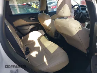 2015 Jeep Cherokee Limited with VIN 1C4PJLDB9FW677367, listed as a IAAI auction lot 41826477 with 125,648 mi miles and . Bid and sale history available at DreamBid. Image 8.