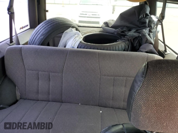 1999 Jeep Cherokee Sport with VIN 1J4FF68S9XL635836, listed as a Copart auction lot 59573195 with 187,035 mi miles and Salvage title. Bid and sale history available at DreamBid. Image 10.