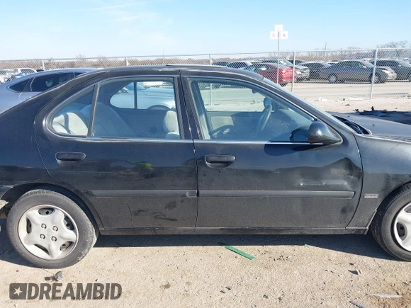 2001 Nissan Altima GXE with VIN 1N4DL01D81C220261, listed as a IAAI auction lot 41146808 with 140,840 mi miles. Bid and sale history available at carsss.com. Image 13.