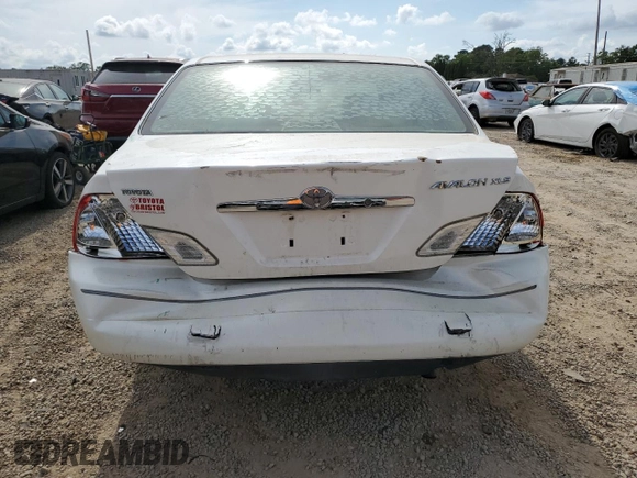 2001 Toyota Avalon XL z VIN 4T1BF28B91U155354, wystawiony jako Copart lot #52393885 z przebiegiem 277 545 mil mil oraz Szkody całkowita. Historia ofert i sprzedaży dostępna na DreamBid. Obrazek 6.