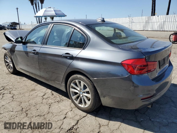 2018 BMW 3 Series 320i with VIN WBA8A9C51JAD26901, listed as a Copart auction lot 52609285 with 36,344 mi miles and Salvage Title. Bid and sale history available at carsss.com. Image 2.