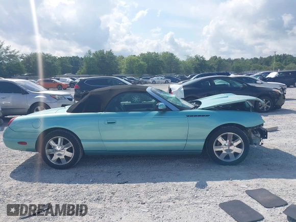 2003 Ford Thunderbird Deluxe z VIN 1FAHP60A33Y110451, wystawiony jako IAAI lot #42133863 z przebiegiem Nie podano mil oraz . Historia ofert i sprzedaży dostępna na DreamBid. Obrazek 14.
