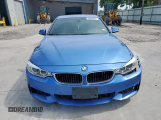 2014 BMW 4 Series 428i with VIN WBA3N3C55EK230214, listed as a Copart auction lot 56896865 with 77,024 mi miles and Salvage title. Bid and sale history available at DreamBid. Image 5.
