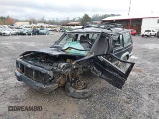1998 Jeep Cherokee Sport z VIN 1J4FJ68S7WL264849, wystawiony jako IAAI lot #41931068 z przebiegiem Nie podano mil oraz . Historia ofert i sprzedaży dostępna na DreamBid. Obrazek 17.