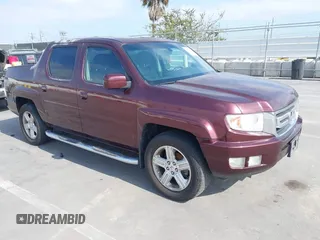 2009 Honda Ridgeline RTL z VIN 5FPYK16599B109441, wystawiony jako IAAI lot #42463881 z przebiegiem 146 510 mil mil oraz . Historia ofert i sprzedaży dostępna na DreamBid. Obrazek 1.