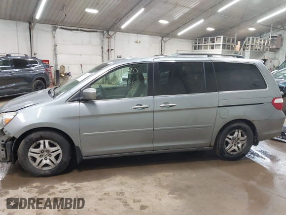 2006 Honda Odyssey EX with VIN 5FNRL38446B044231, listed as a IAAI auction lot 42080586 with 211,908 mi miles. Bid and sale history available at carsss.com. Image 14.