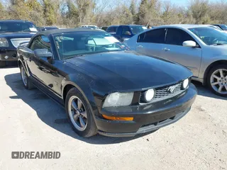 2005 Ford Mustang GT Deluxe with VIN 1ZVFT85H455226449, listed as a IAAI auction lot 41771971 with 128,570 mi miles and . Bid and sale history available at DreamBid. Image 1.