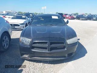 2014 Dodge Charger Police with VIN 2C3CDXAT9EH261962, listed as a IAAI auction lot 42183216 with 166,916 mi miles and . Bid and sale history available at carsss.com. Image 12.