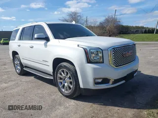2017 GMC Yukon Denali with VIN 1GKS2CKJ4HR148397, listed as a IAAI auction lot 41942659 with 167,719 mi miles. Bid and sale history available at carsss.com. Image 1.
