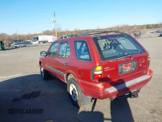 1999 Isuzu Rodeo S with VIN 4S2CM58W6X4336332, listed as a IAAI auction lot 41758338 with 183,983 mi miles. Bid and sale history available at carsss.com. Image 3.