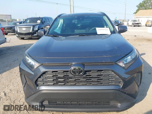 2019 Toyota RAV4 LE with VIN JTMK1RFV0KD003070, listed as a IAAI auction lot 42051761 with 86,651 mi miles. Bid and sale history available at carsss.com. Image 12.