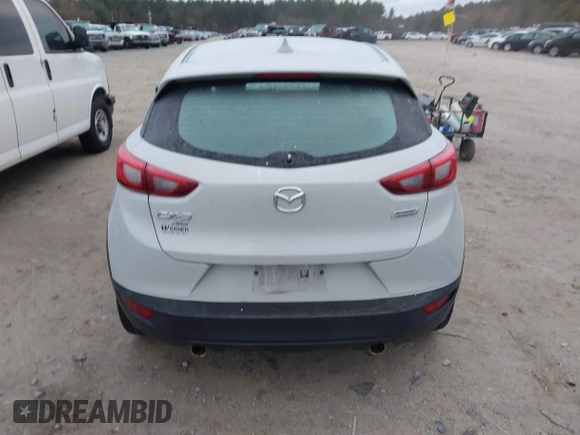 2016 Mazda CX-3 Grand Touring with VIN JM1DKFD7XG0132084, listed as a IAAI auction lot 41004954 with 70,476 mi miles. Bid and sale history available at carsss.com. Image 16.