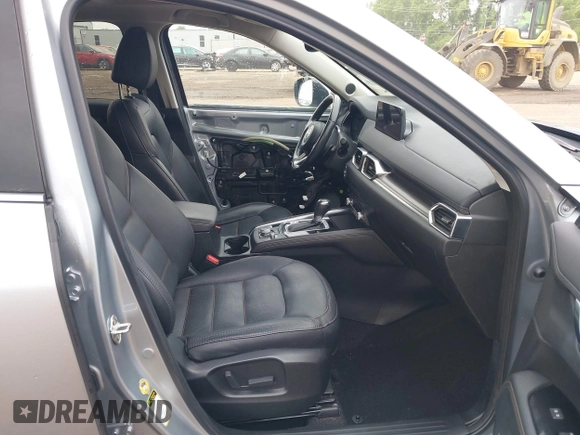 2021 Mazda CX-5 Grand Touring with VIN JM3KFBDM4M0371496, listed as a IAAI auction lot 42428860 with 113,735 mi miles and . Bid and sale history available at DreamBid. Image 5.