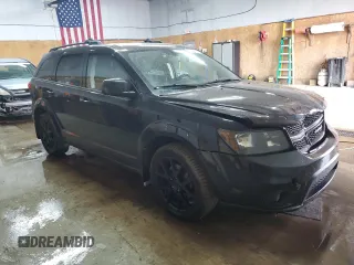 2013 Dodge Journey Crew with VIN 3C4PDCCG4DT693869, listed as a Copart auction lot 63666684 with 134,424 mi miles and Salvage title. Bid and sale history available at DreamBid. Image 4.