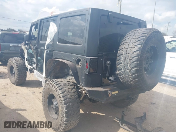 2014 Jeep Wrangler Unlimited Rubicon X with VIN 1C4HJWFG3EL274905, listed as a IAAI auction lot 41512631 with 123,961 mi miles and . Bid and sale history available at DreamBid. Image 3.