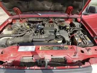 2003 Mazda B-Series Truck SX z VIN 4F4YR12D83TM01711, wystawiony jako Copart lot #56626605 z przebiegiem 179 991 mil mil oraz Szkody całkowita. Historia ofert i sprzedaży dostępna na DreamBid. Obrazek 11.
