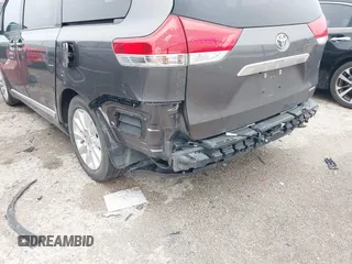 2011 Toyota Sienna XLE AAS with VIN 5TDYK3DC9BS158209, listed as a IAAI auction lot 42163526 with 107,385 mi miles and . Bid and sale history available at DreamBid. Image 6.