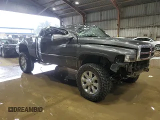 2001 Dodge 2500 z VIN 3B7KF23681G728181, wystawiony jako Copart lot #54211935 z przebiegiem 257 639 mil mil oraz Szkoda całkowita • Salvage title. Historia ofert i sprzedaży dostępna na DreamBid. Obrazek 4.
