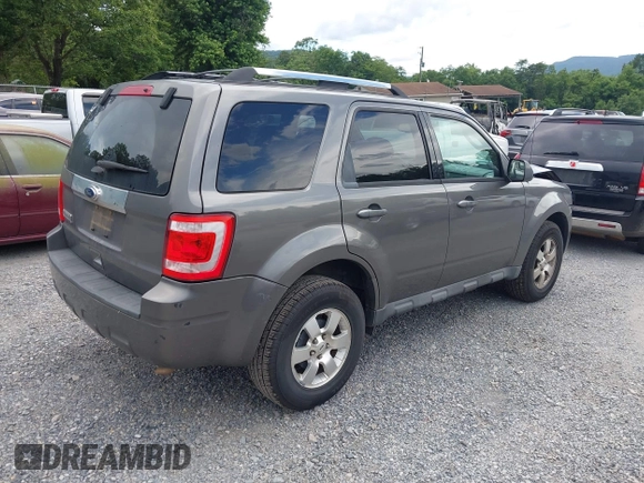 2011 Ford Escape Limited with VIN 1FMCU0E7XBKC69410, listed as a IAAI auction lot 42458547 with 126,022 mi miles and . Bid and sale history available at DreamBid. Image 4.