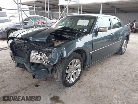 2006 Chrysler 300 C with VIN 2C3KA63H66H318725, listed as a IAAI auction lot 41629398 with 157,367 mi miles. Bid and sale history available at carsss.com. Image 18.