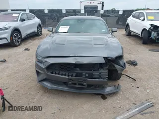 2021 Ford Mustang EcoBoost with VIN 1FA6P8TH1M5152941, listed as a IAAI auction lot 42110646 with 26,673 mi miles and . Bid and sale history available at DreamBid. Image 6.
