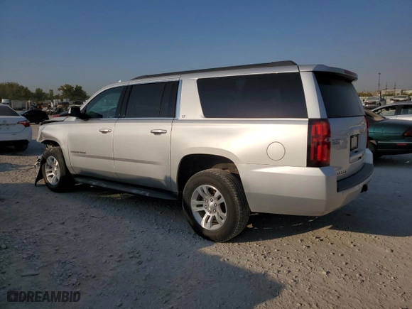 2017 Chevrolet Suburban LT with VIN 1GNSKHKCXHR309143, listed as a Copart auction lot 71408224 with 193,643 mi miles and Salvage Title. Bid and sale history available at carsss.com. Image 2.