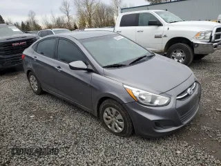 2015 Hyundai Accent GLS with VIN KMHCT4AEXFU817530, listed as a Copart auction lot 84663344 with 125,410 mi miles and Salvage Title. Bid and sale history available at carsss.com. Image 4.
