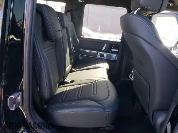 2023 Mercedes-Benz G 550 with VIN W1NYC6BJ3PX461528, listed as a Copart auction lot 87510075 with 19,992 mi miles and Salvage Title. Bid and sale history available at DreamBid. Image 12.