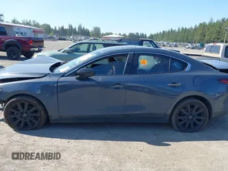 2023 Mazda 3 S Carbon Edition with VIN 3MZBPACM5PM376545, listed as a IAAI auction lot 42404054 with Not provided miles and . Bid and sale history available at DreamBid. Image 14.