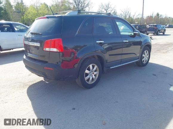 2013 Kia Sorento LX with VIN 5XYKTCA60DG347929, listed as a IAAI auction lot 42144507 with 210,216 mi miles. Bid and sale history available at carsss.com. Image 4.