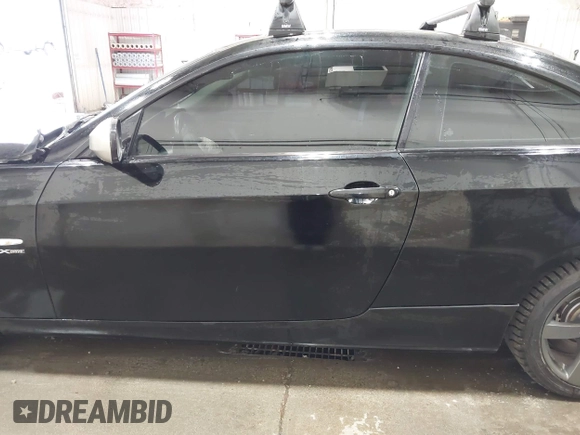 2011 BMW 3 Series 335i xDrive with VIN WBAKF9C53BE247177, listed as a IAAI auction lot 41973181 with 113,986 mi miles. Bid and sale history available at carsss.com. Image 14.