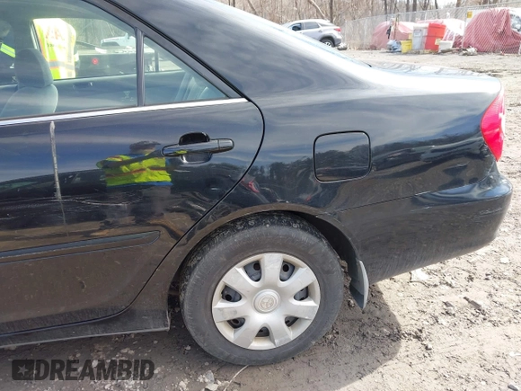 2004 Toyota Camry LE with VIN 4T1BE32K94U307994, listed as a IAAI auction lot 41847450 with 164,016 mi miles and . Bid and sale history available at carsss.com. Image 6.