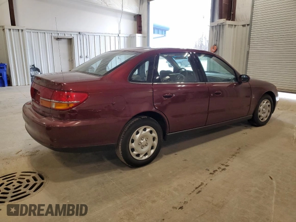 2001 Saturn LS z VIN 1G8JU52F51Y549021, wystawiony jako Copart lot #81109084 z przebiegiem 14 974 mil mil oraz Tytuł czysty. Historia ofert i sprzedaży dostępna na DreamBid. Obrazek 3.