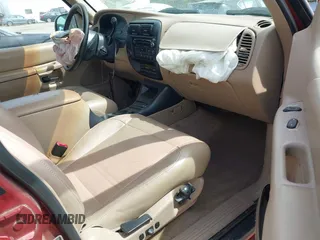 1999 Ford Explorer XLT z VIN 1FMZU35P4XUA38932, wystawiony jako IAAI lot #41953981 z przebiegiem 117 876 mil mil oraz . Historia ofert i sprzedaży dostępna na DreamBid. Obrazek 5.