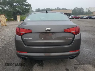 2013 Kia Optima EX z VIN 5XXGN4A70DG207530, wystawiony jako Copart lot #58270795 z przebiegiem 188 998 mil mil oraz Szkoda całkowita • Salvage title. Historia ofert i sprzedaży dostępna na DreamBid. Obrazek 6.