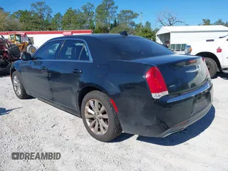 2015 Chrysler 300 Limited with VIN 2C3CCARG9FH838420, listed as a IAAI auction lot 41684228 with 242,316 mi miles. Bid and sale history available at carsss.com. Image 3.