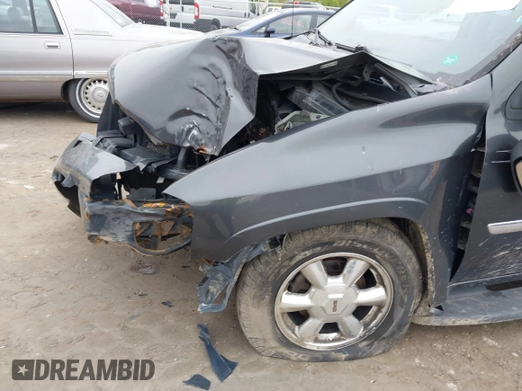 2007 GMC Envoy SLE z VIN 1GKDS13S572214421, wystawiony jako IAAI lot #42186747 z przebiegiem Nie podano mil oraz . Historia ofert i sprzedaży dostępna na DreamBid. Obrazek 6.