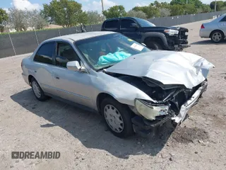 2002 Honda Accord LX z VIN JHMCG56462C005400, wystawiony jako IAAI lot #41893400 z przebiegiem Nie podano mil oraz . Historia ofert i sprzedaży dostępna na DreamBid. Obrazek 1.